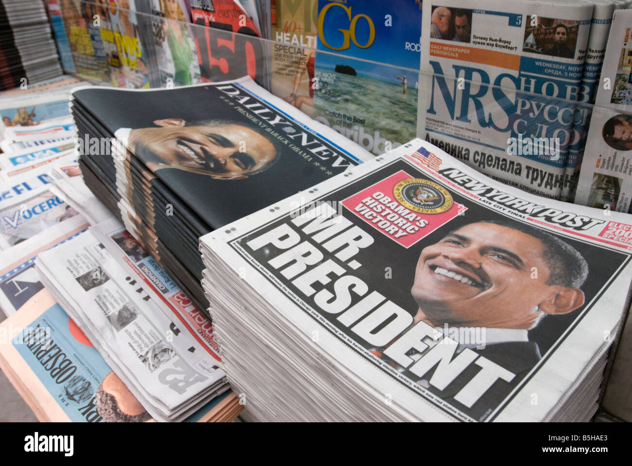 Newspapers at a New York City newsstand announcing Barack Obama's historic presidential win in 2008 Stock Photo