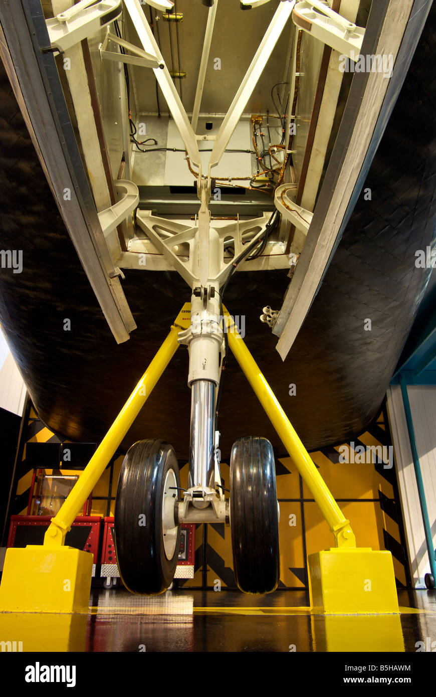Space Shuttle orbiting satellite nose wheel assembly display at Houston Space Center Stock Photo