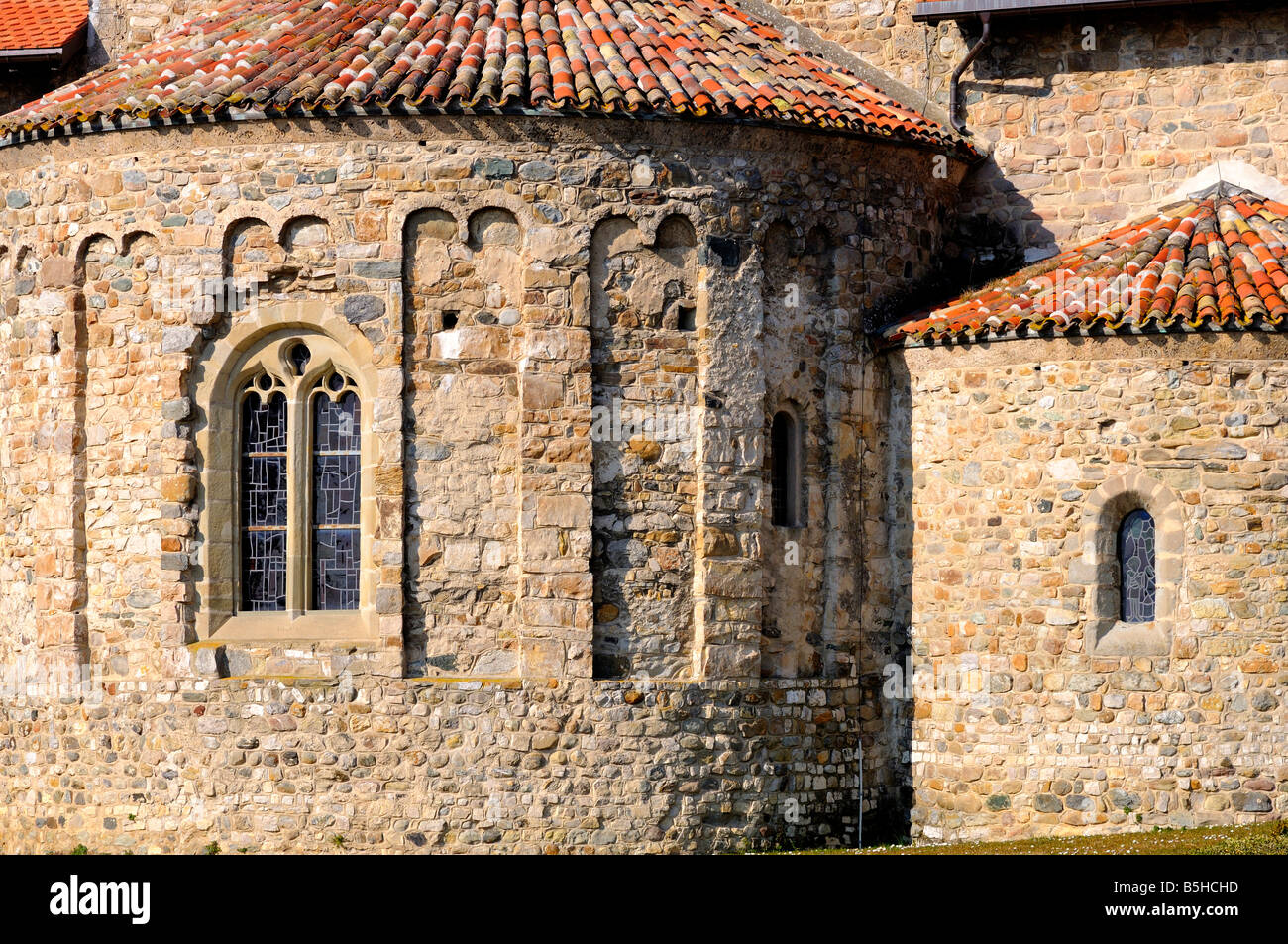 Apse with window, Romanesque church St Sulpice, Canton of Vaud, Switzerland Stock Photo