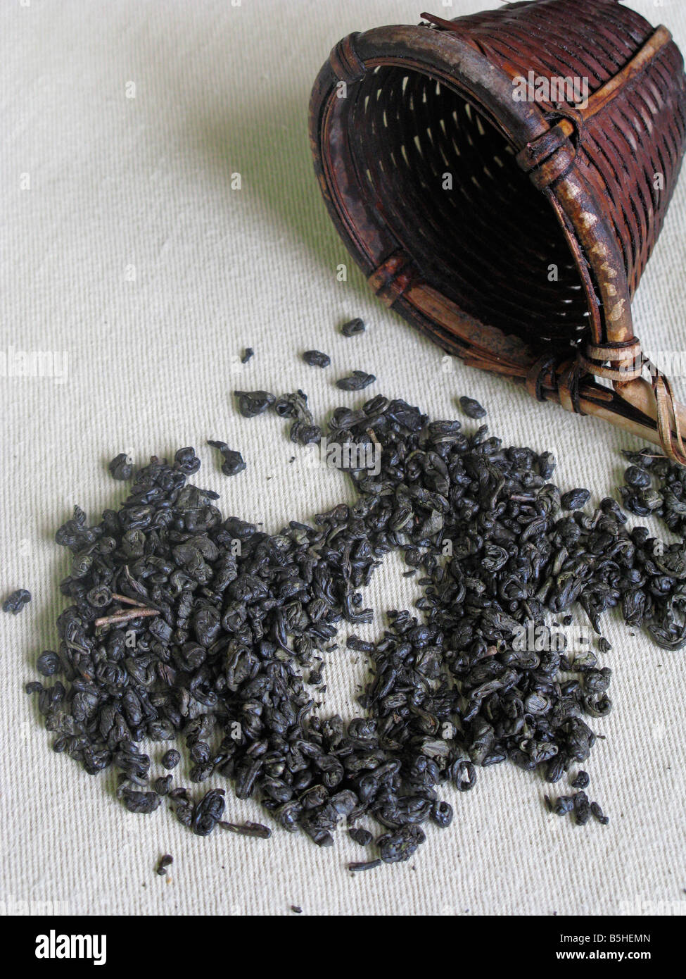 Chinese Green Tea Leaves and Bamboo Tea Strainer Stock Photo Alamy