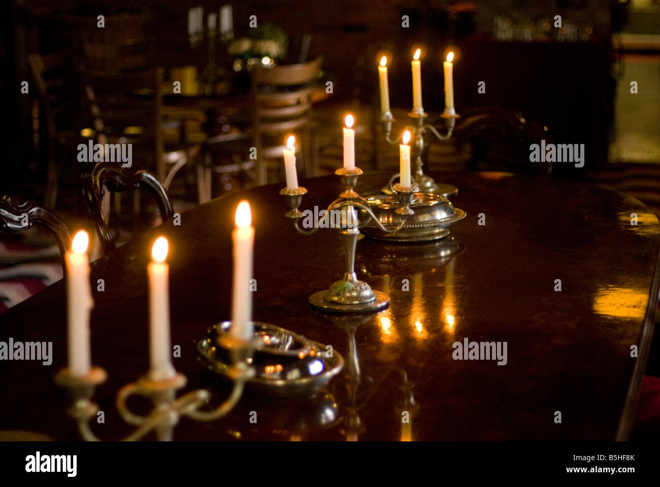 antique candelabra on dining table Stock Photo Alamy