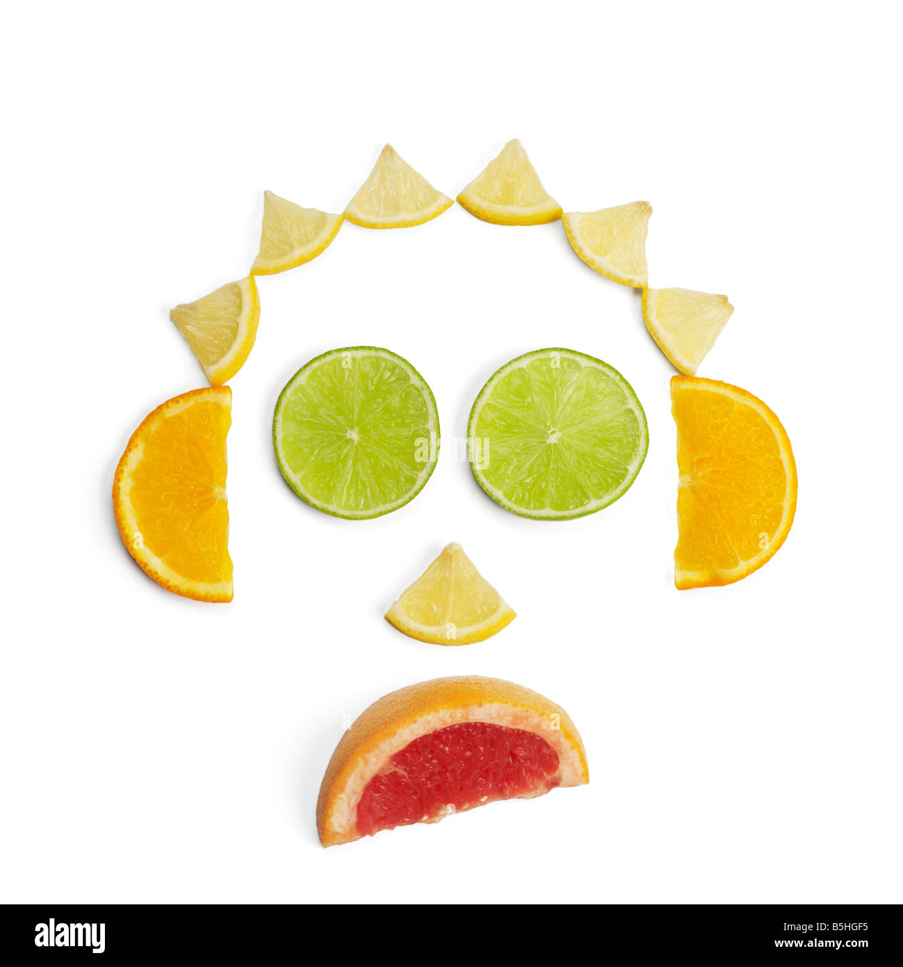 Face made of citrus fruit Stock Photo