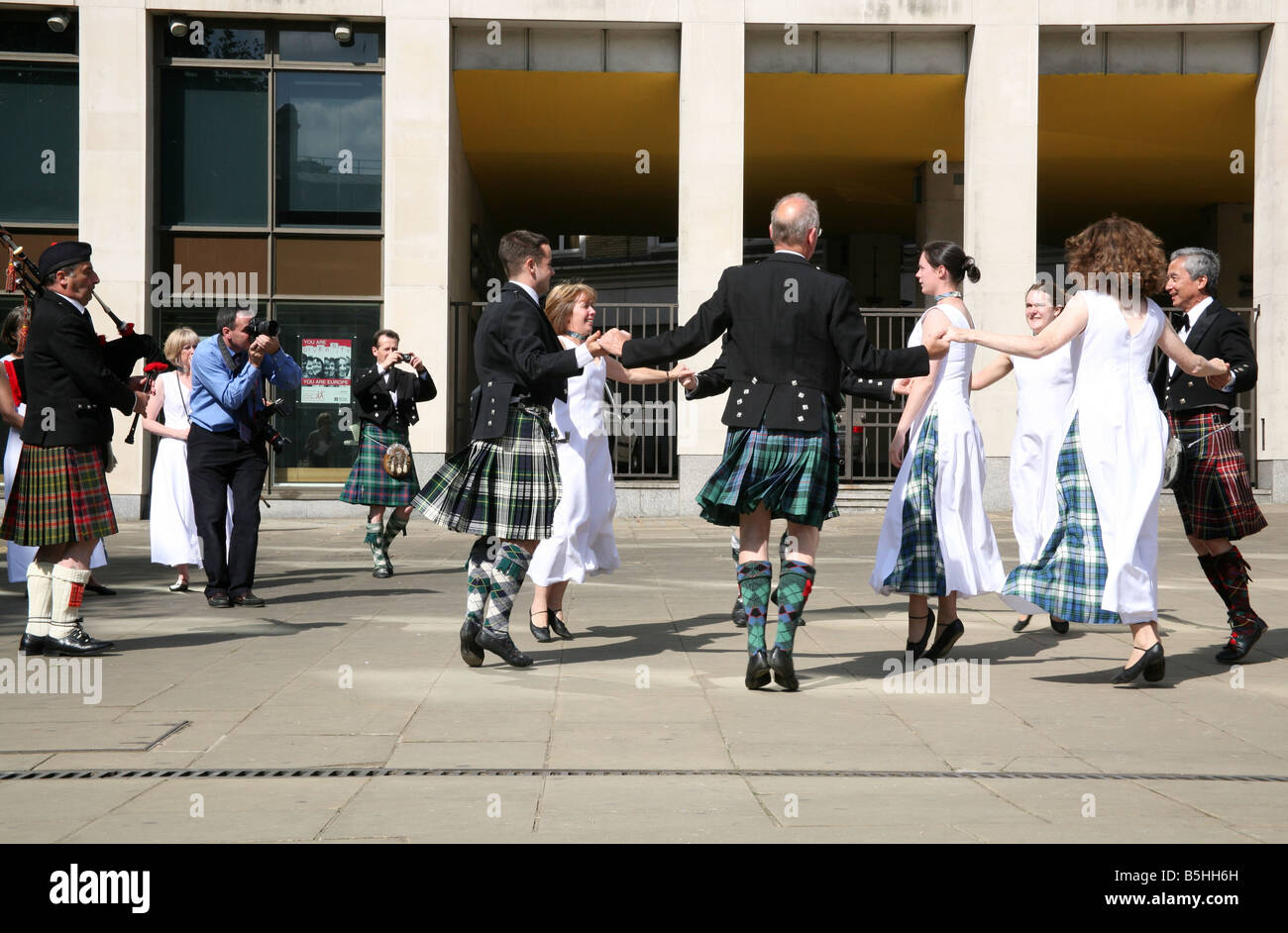 Scottish Highland dancers performing in open air in London Stock Photo