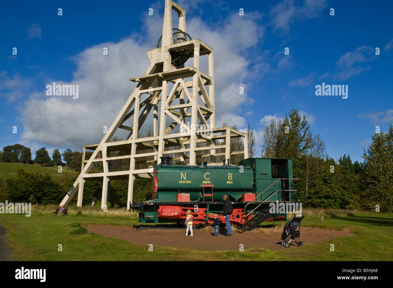 dh Lochore Meadows Country Park BALLINGRY FIFE Old mine shaft pithead family at colliery stream coal train mining Scotland Stock Photo