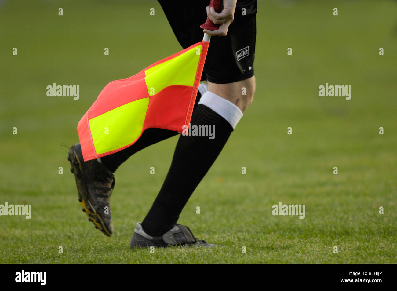 football lineman's flag and leg Stock Photo Alamy