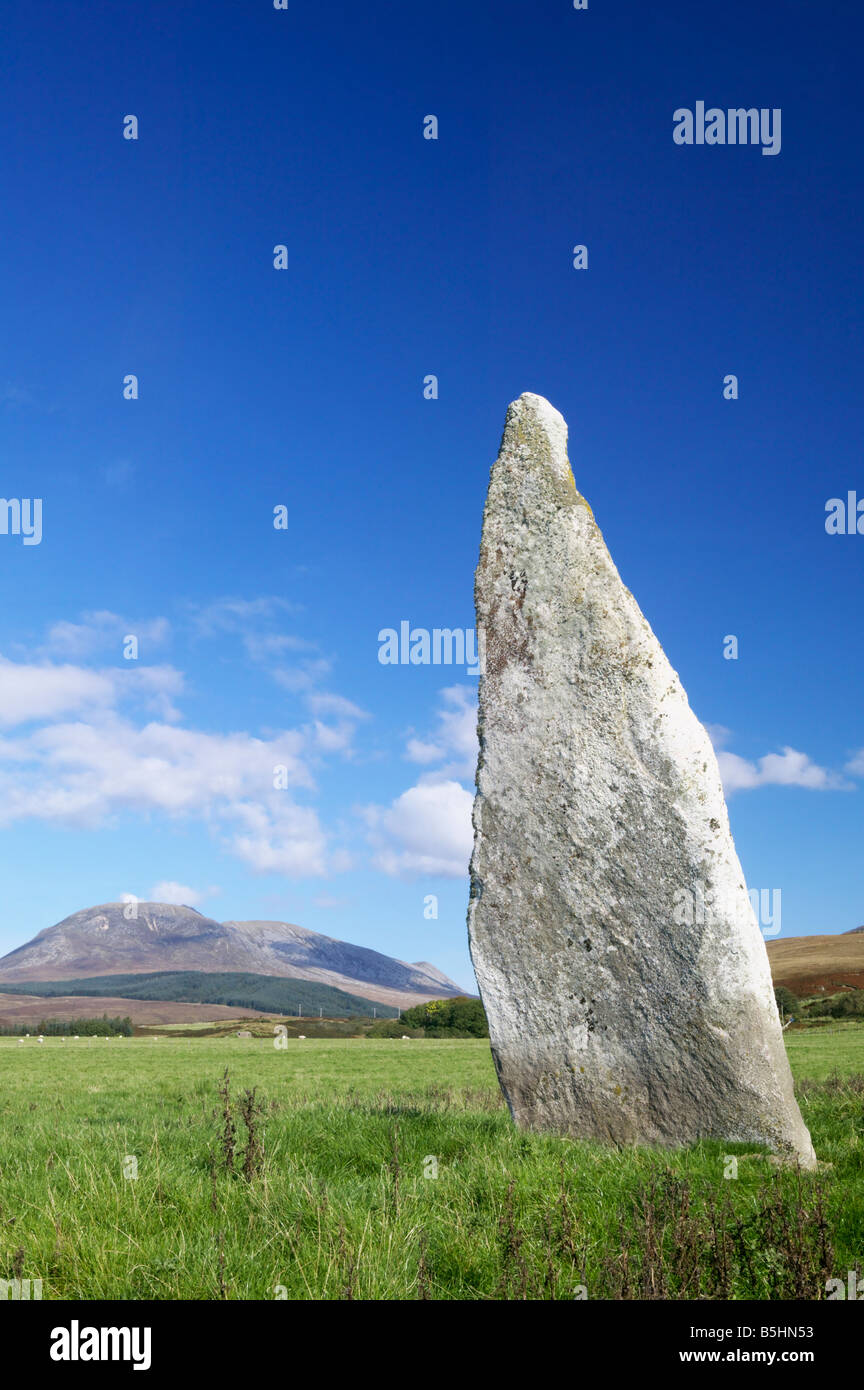 Auchencar Standing Stone, Auchencar, Isle of Arran, North Ayrshire, Scotland, UK. Beinn Bharrain in the background Stock Photo