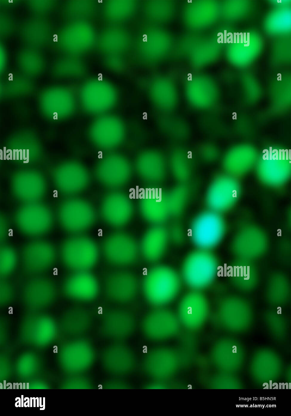 Abstract green glowing lights on dark background Stock Photo - Alamy
