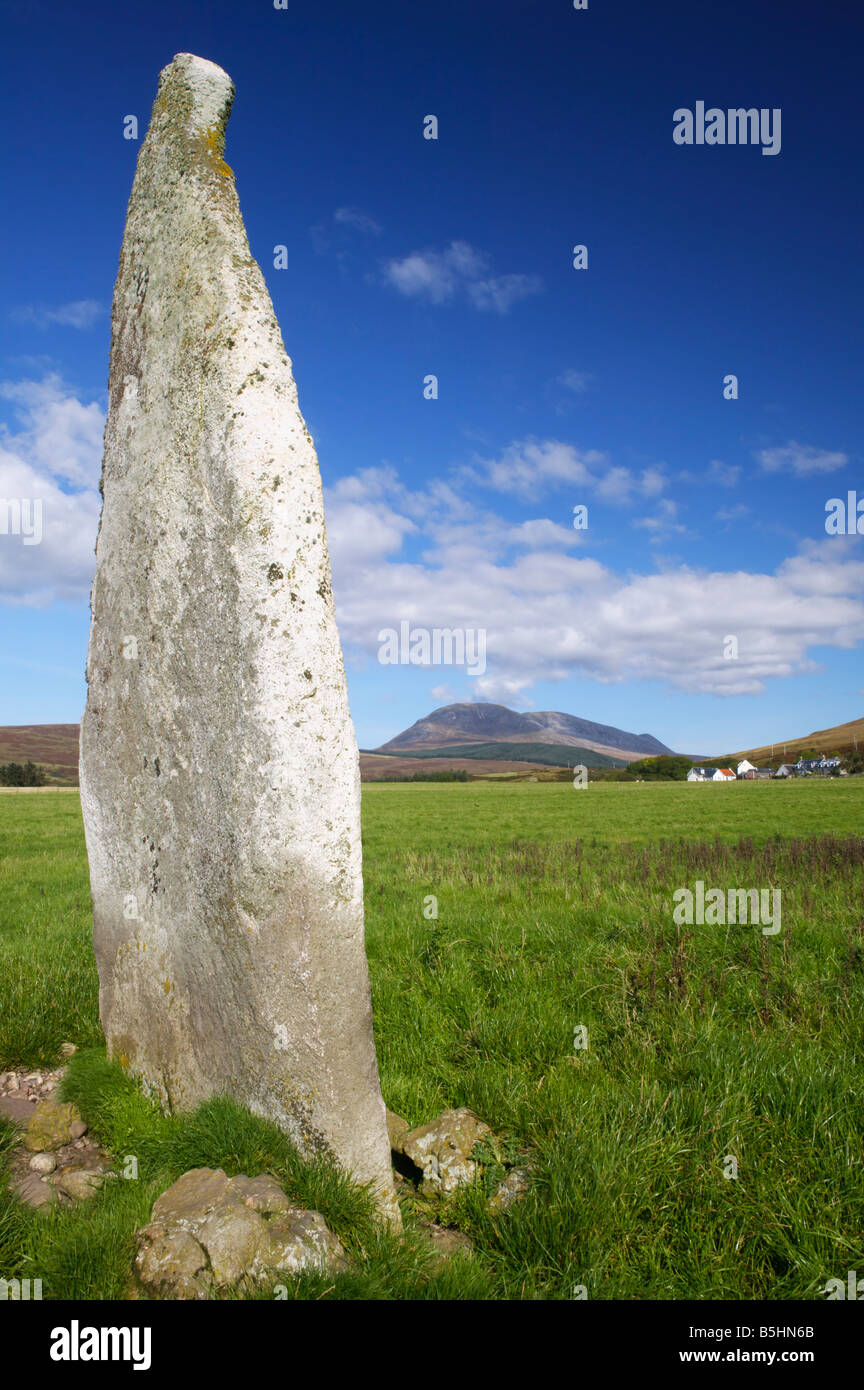 Auchencar Standing Stone, Auchencar, Isle of Arran, North Ayrshire, Scotland, UK. Beinn Bharrain in the background Stock Photo