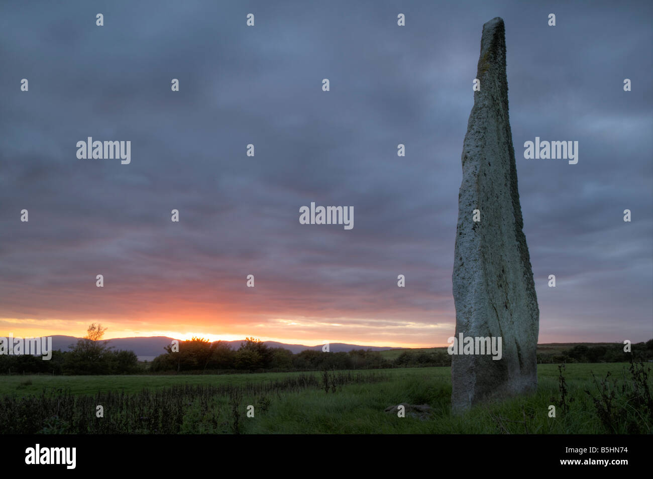 Auchencar Standing Stone, Auchencar, Isle of Arran, North Ayrshire, Scotland, UK. View towards Kintyre. Stock Photo