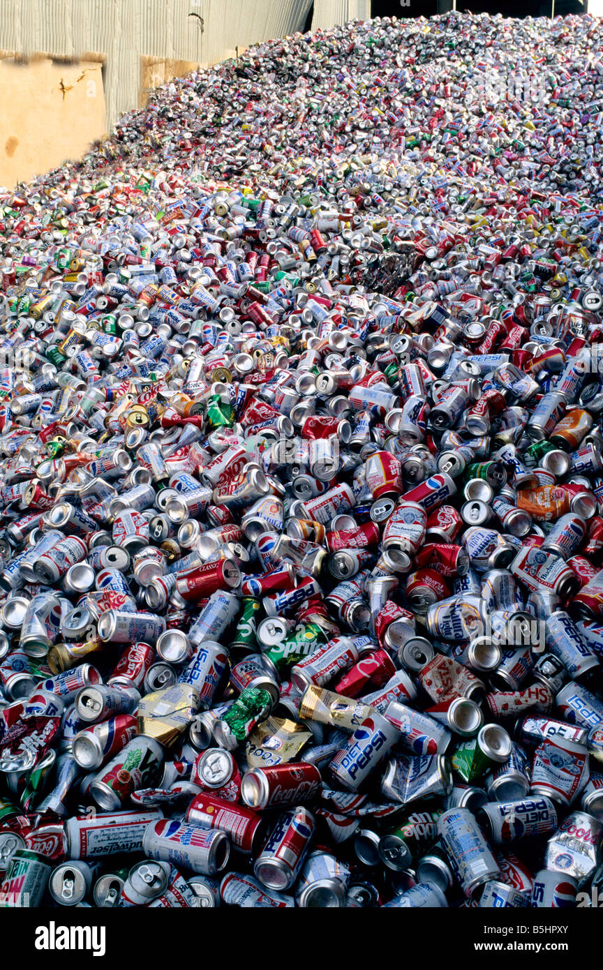 Piled aluminum soft drink cans at recycle center. Stock Photo