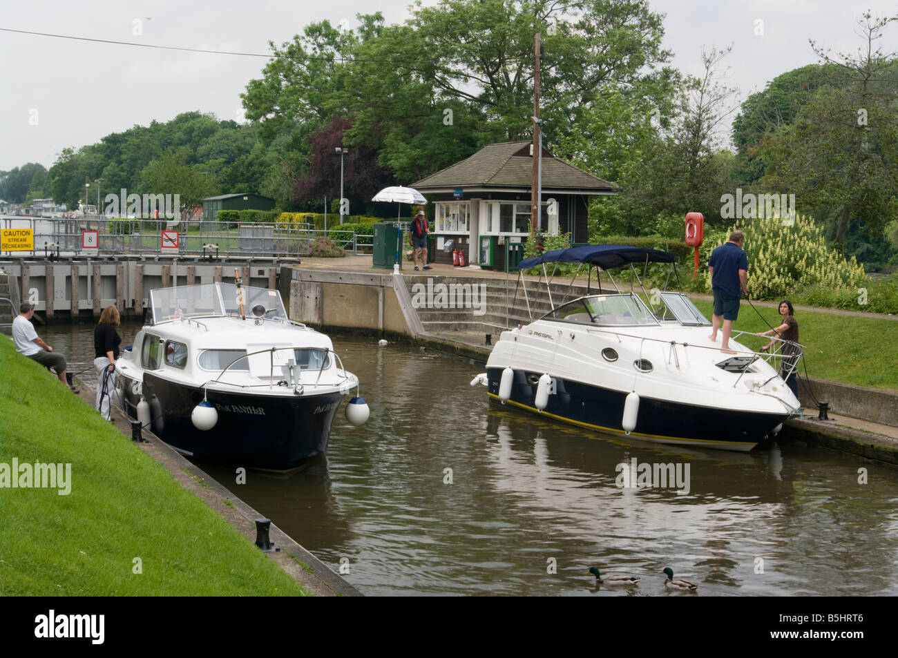 Boats In Molesey Lock on the River Thames at Molesey Surrey UK Stock Photo