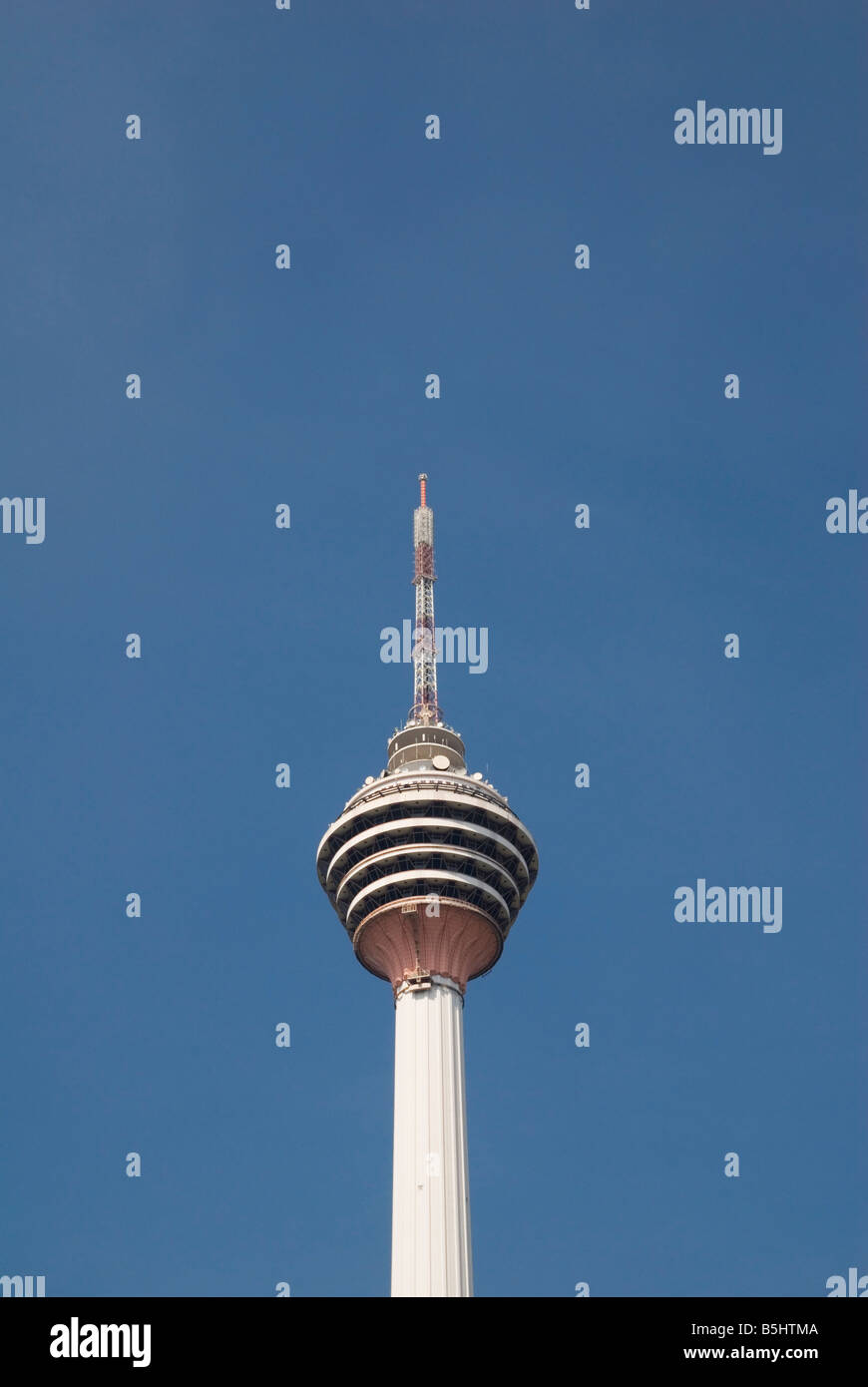 Menara Kuala Lumpur, the Kuala Lumpur Tower,  is a 421m tall telecommunications tower containing an observatory and revolving restaurant, Malaysia Stock Photo