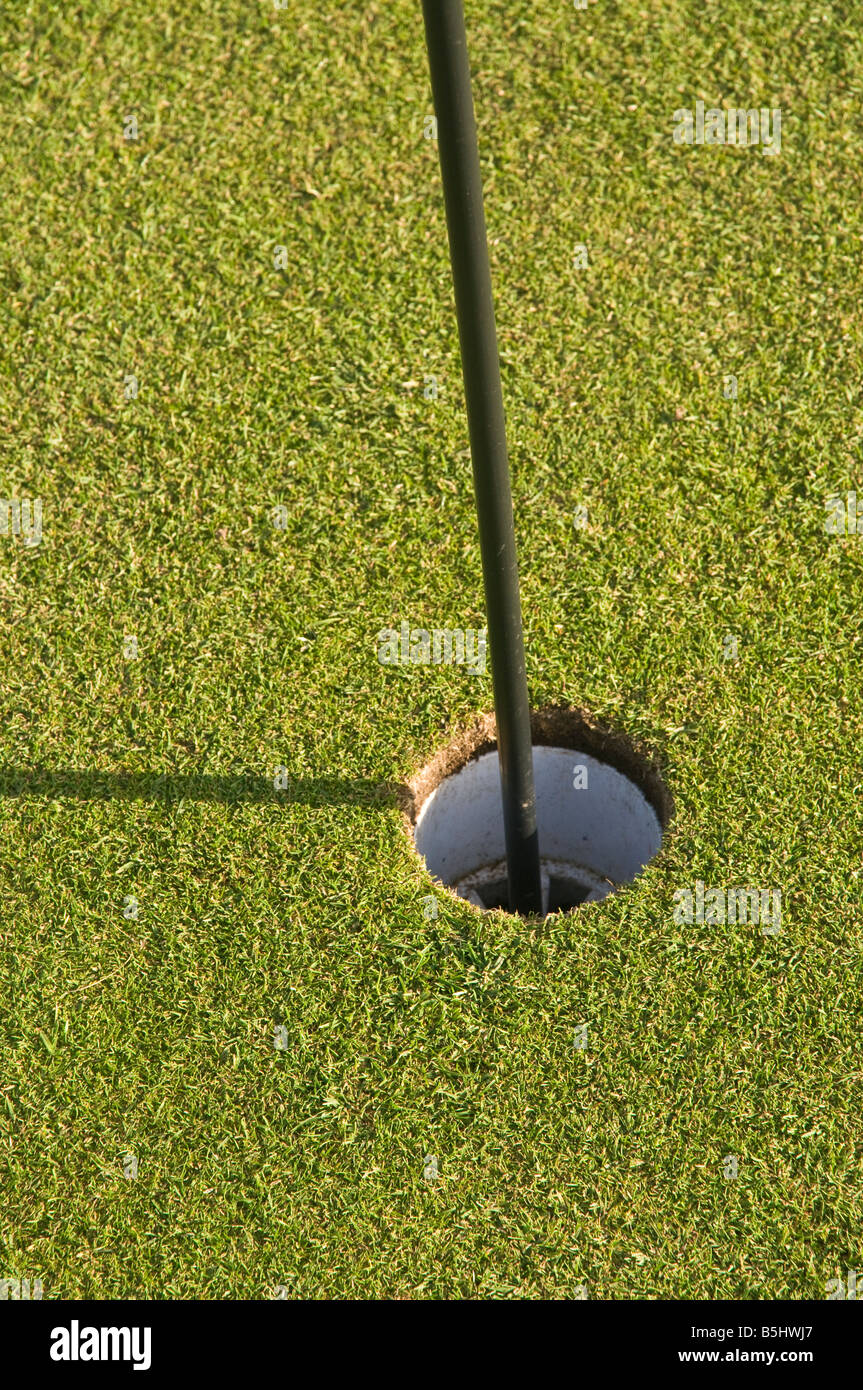 Hole on the green of a golf course. Stock Photo