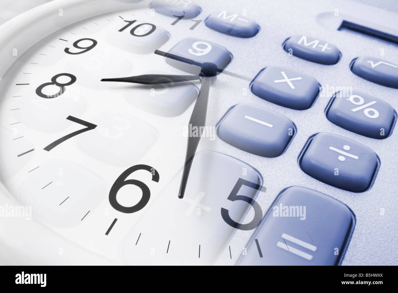 Wall Clock and Calculator Stock Photo - Alamy