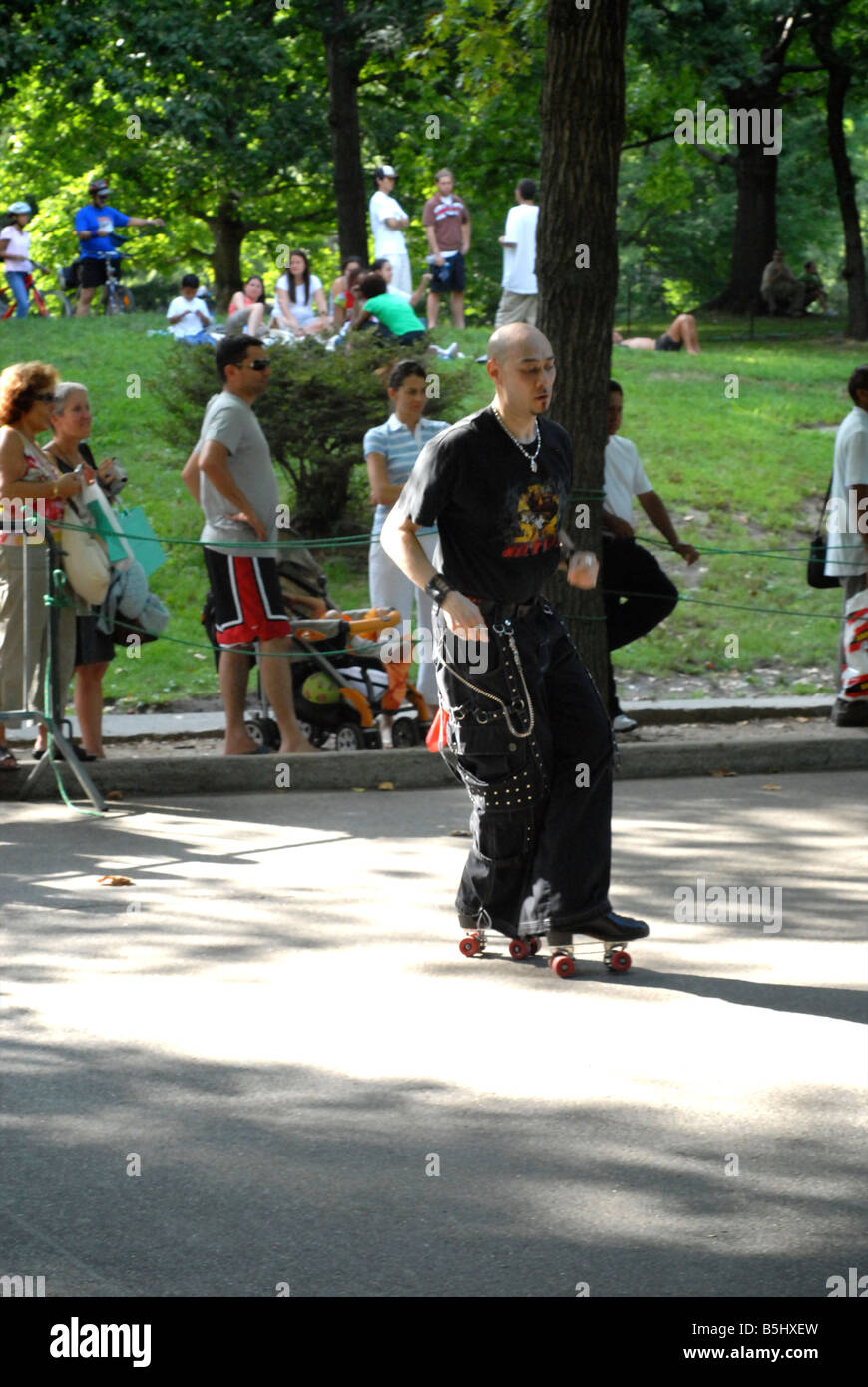 Roller skating group in Central Park, sunday afternoon, New York Stock
