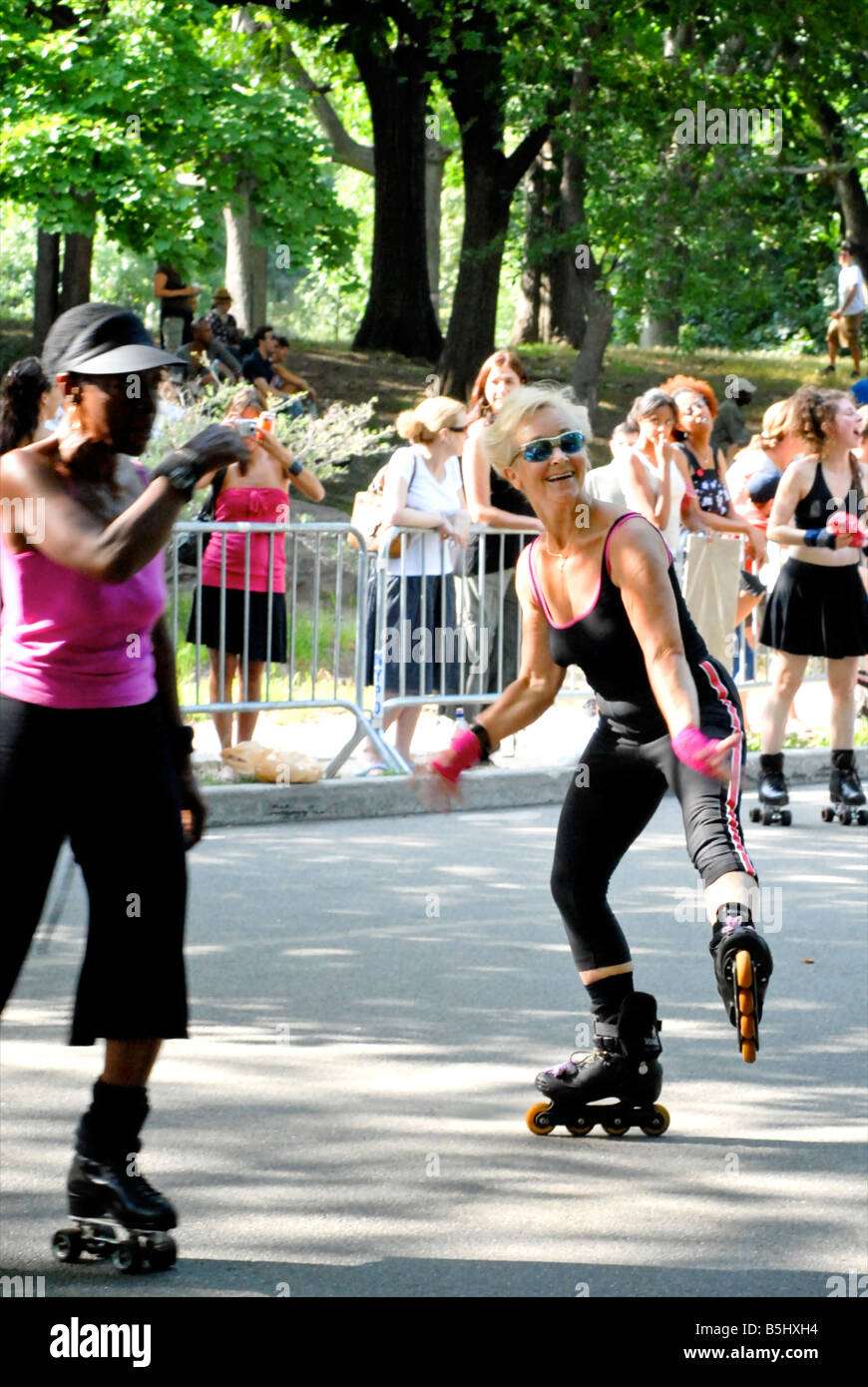 Having fun roller skating in Central Park on a sunday afternoon Stock