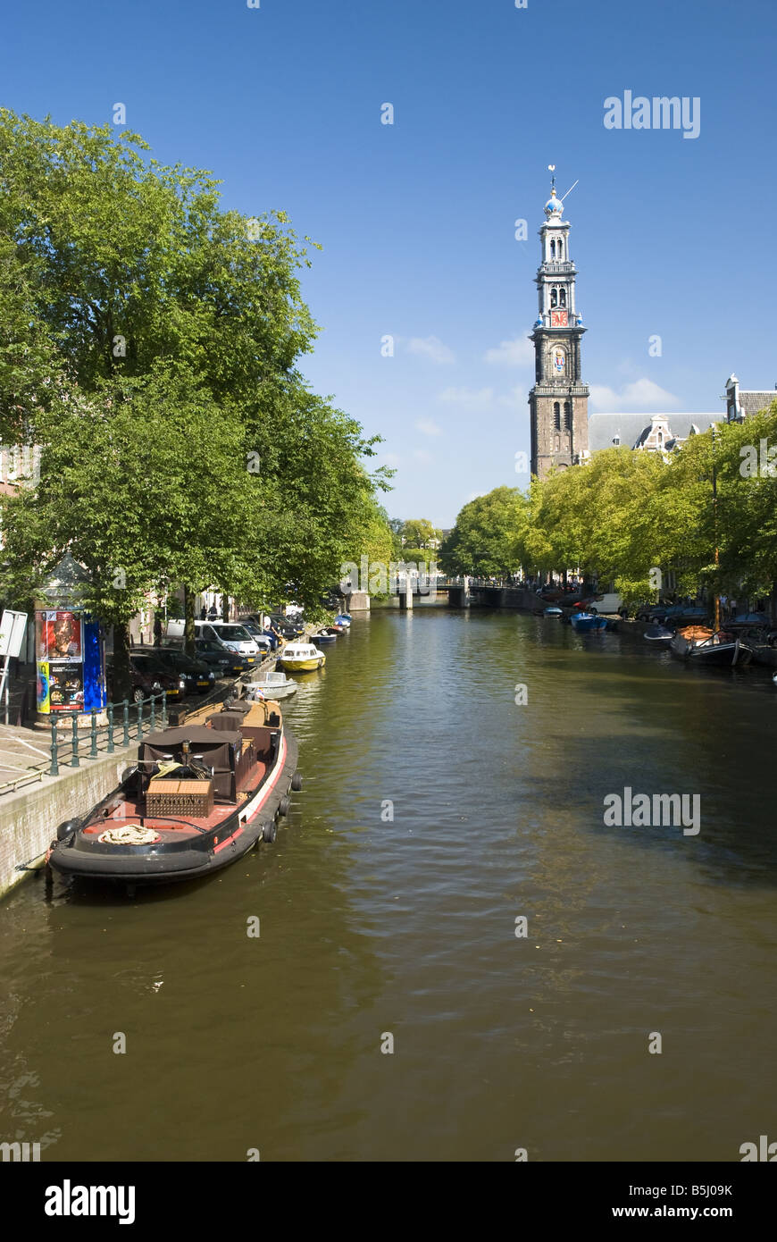 A tree lined canal in Amsterdam, The Netherlands. Stock Photo