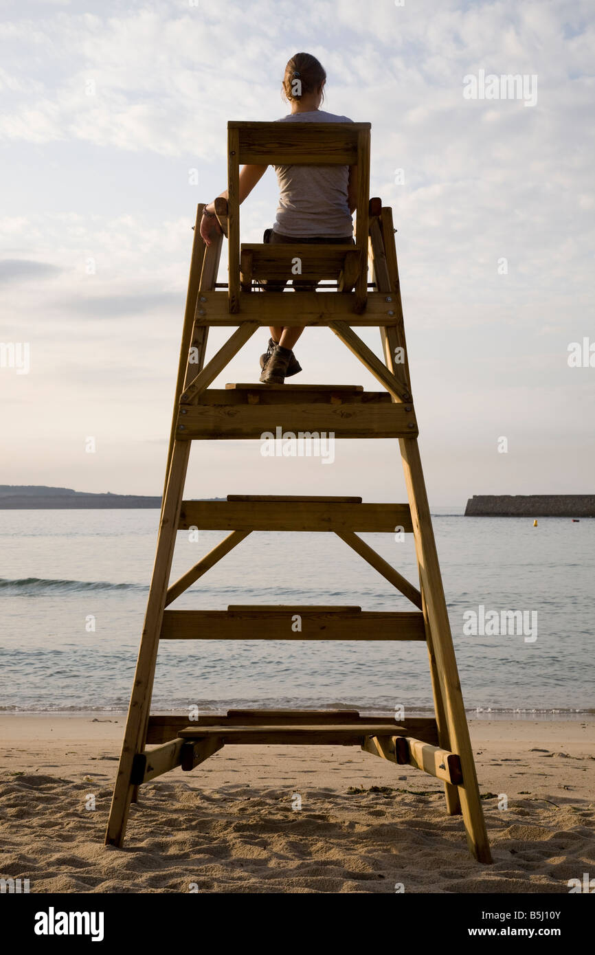 Woman and lifeguard chair hi res stock photography and images Alamy