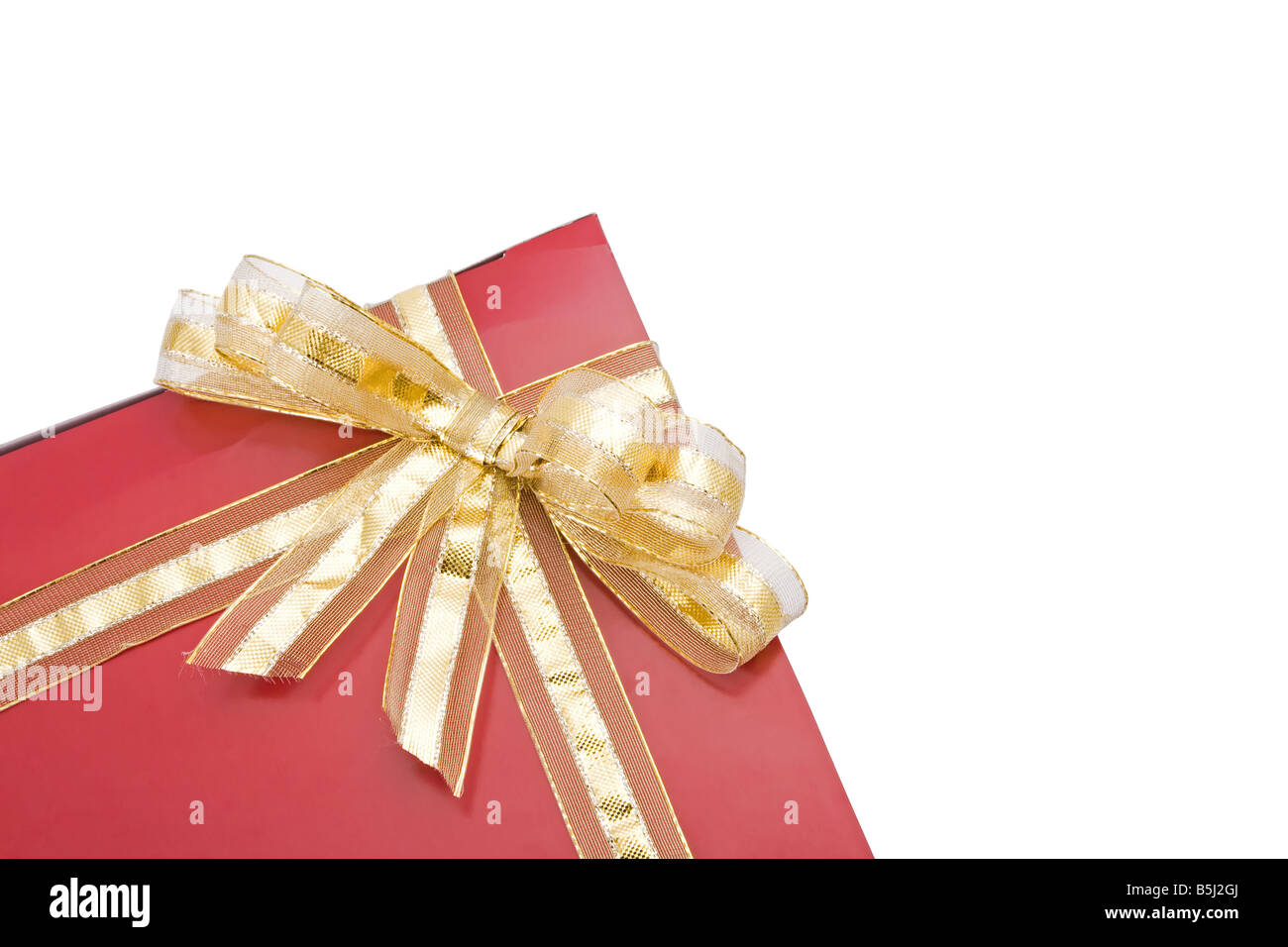 Red gift with a golden bow isolated on white background Stock Photo - Alamy