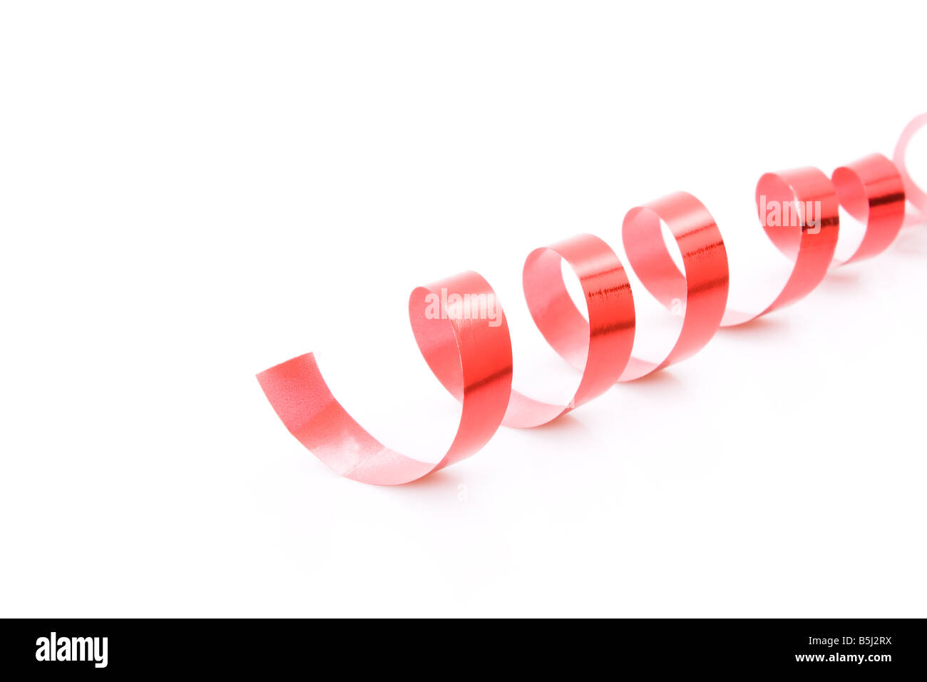 Bright red ribbon isolated on white background Stock Photo