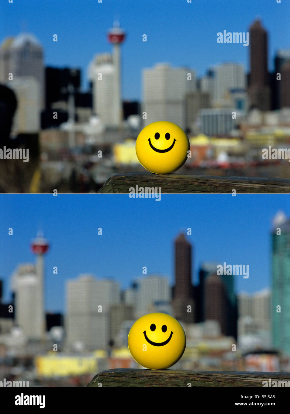 A smiley rubber ball against a cityscape in the background. Stock Photo