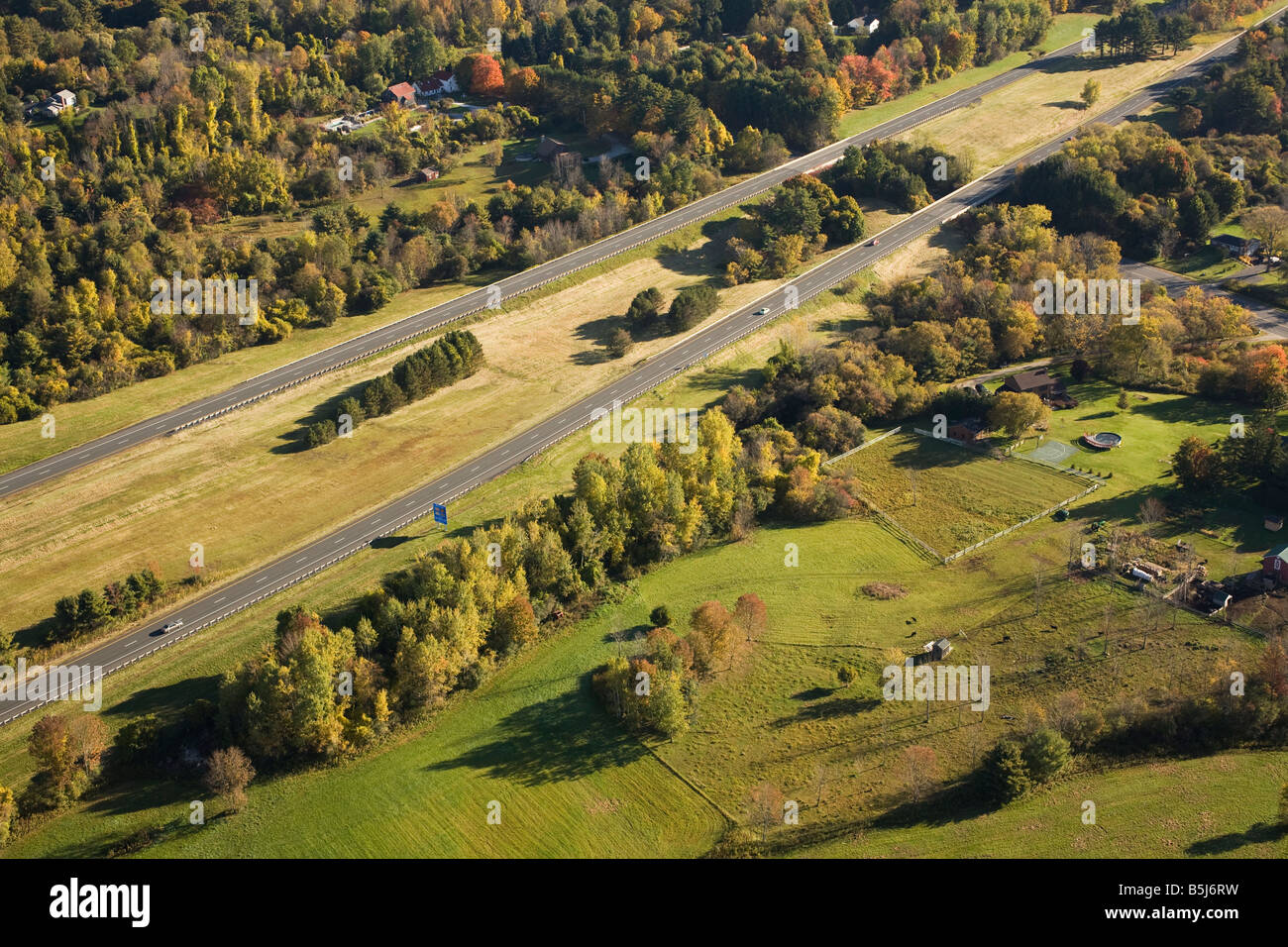 Massachusetts Turnpike running through Stockbridge Massachusetts on a fall morning View is looking south from a hot air balloon Stock Photo