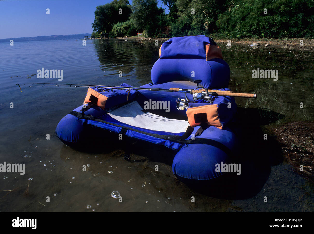 Belly Boat, spinning and fly fishing equipment Stock Photo - Alamy