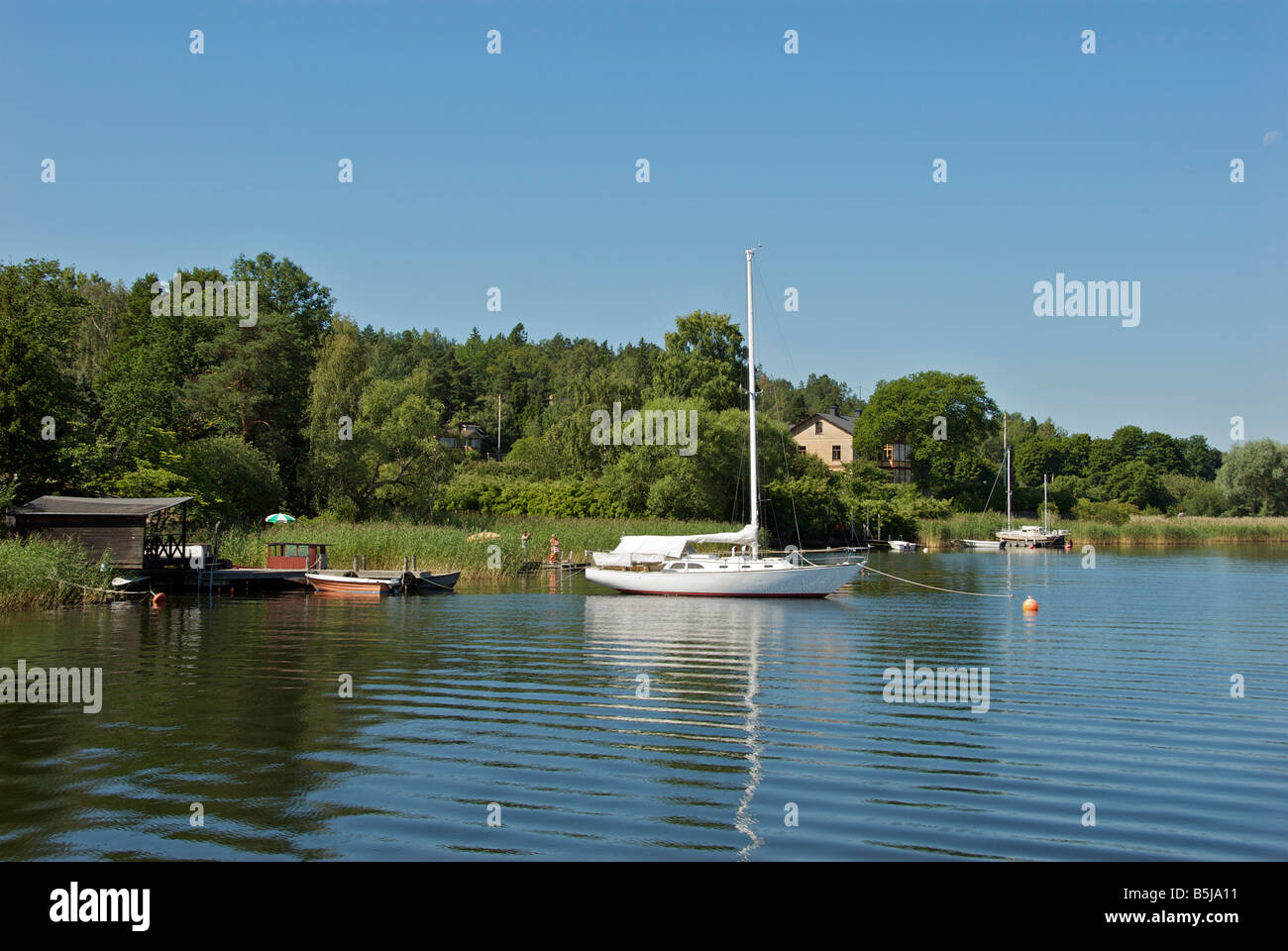Peaceful lakeside scene Lake Malaren near Stockholm Sweden Stock Photo