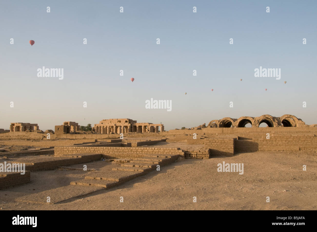 Hot air balloons hovering over east bank of Luxor, Egypt Stock Photo