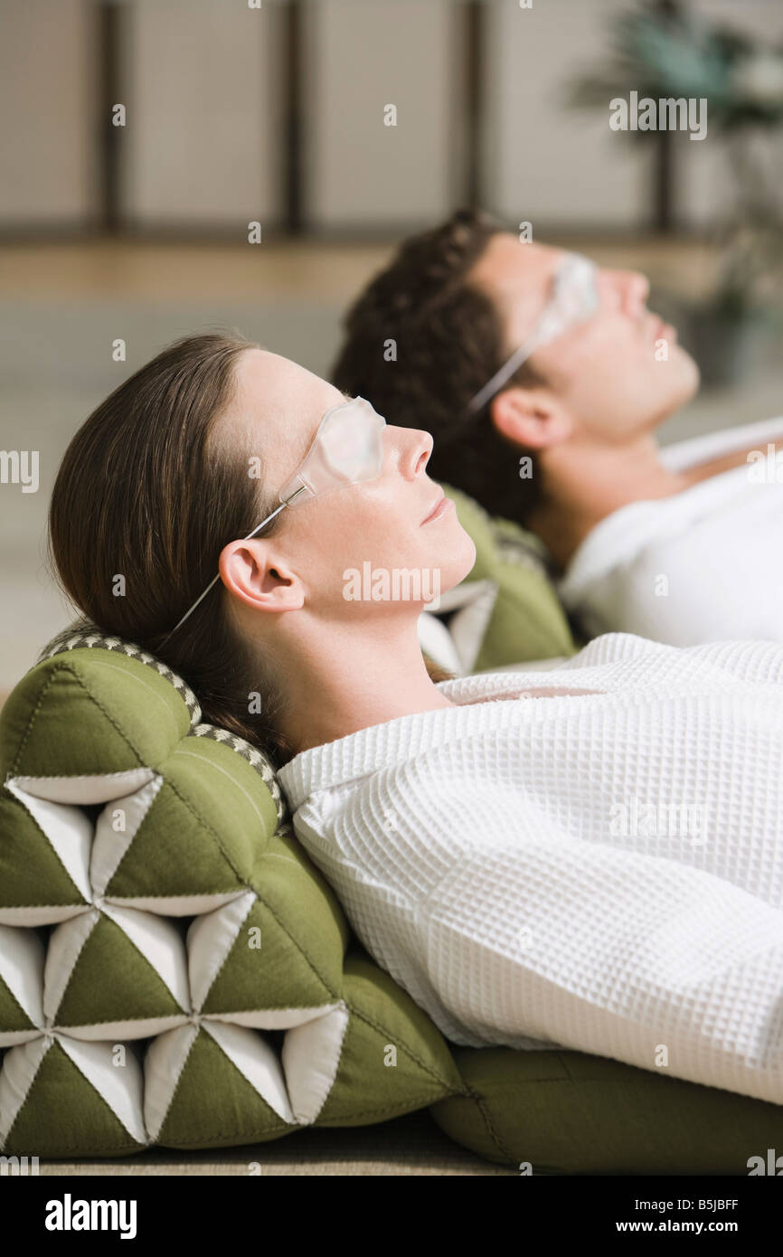 couple sleeping wearing sleep masks Stock Photo Alamy