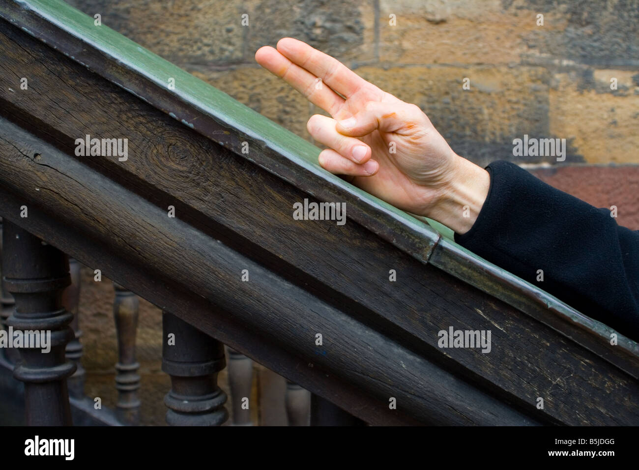 Man s hand on the railings Stock Photo