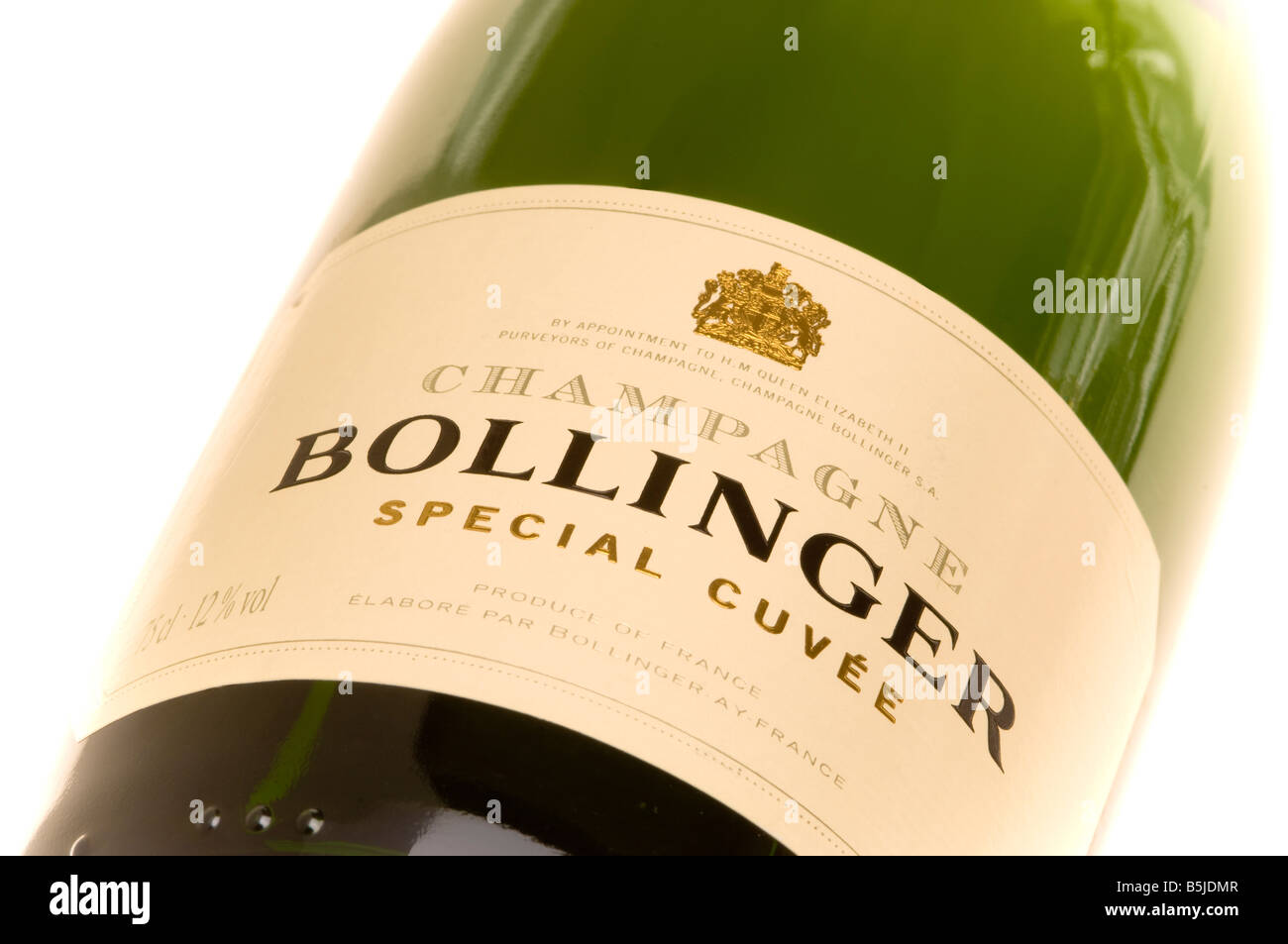 Closeup of the label on a bottle of Bollinger Champagne, seen against a white background. Stock Photo