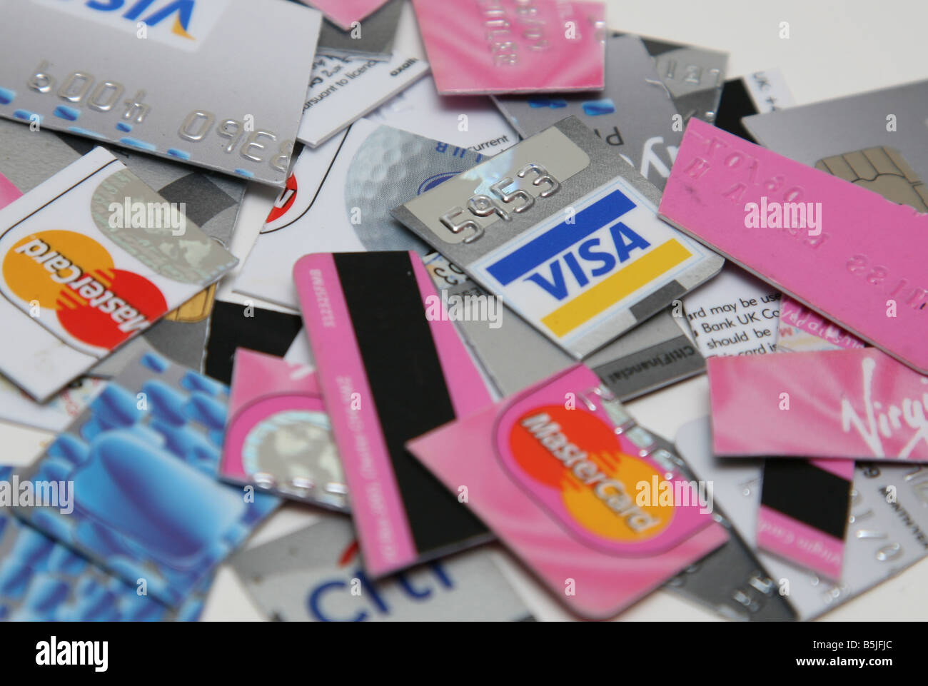 A heap of cut up credit cards Stock Photo Alamy