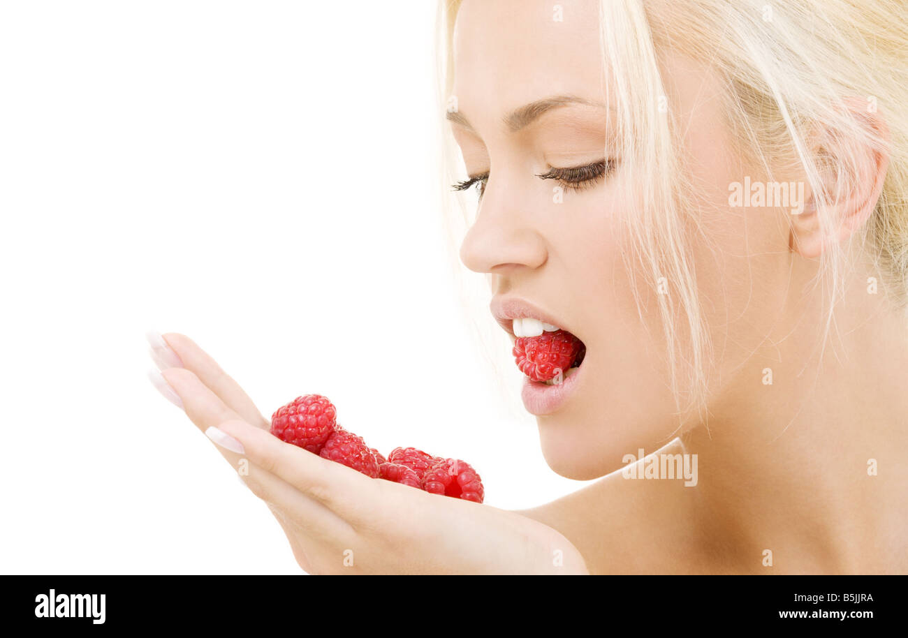 Woman Named Raspberry picture of lovely woman with raspberries over white Stock Photo - Alamy