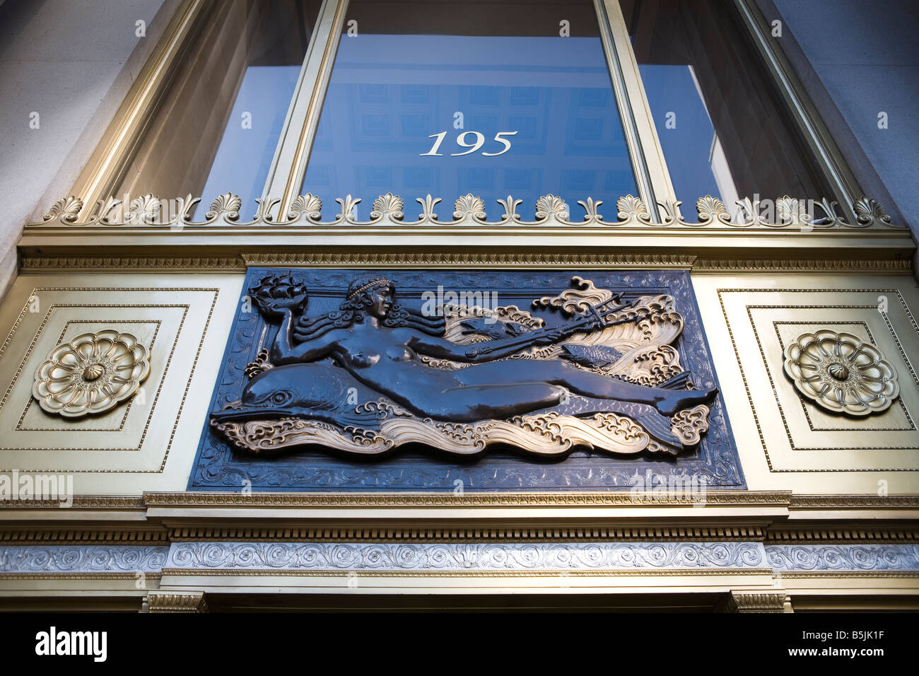 Art Deco style doorway in the area of Rockefeller Centre, New York City Manhattan USA Stock Photo