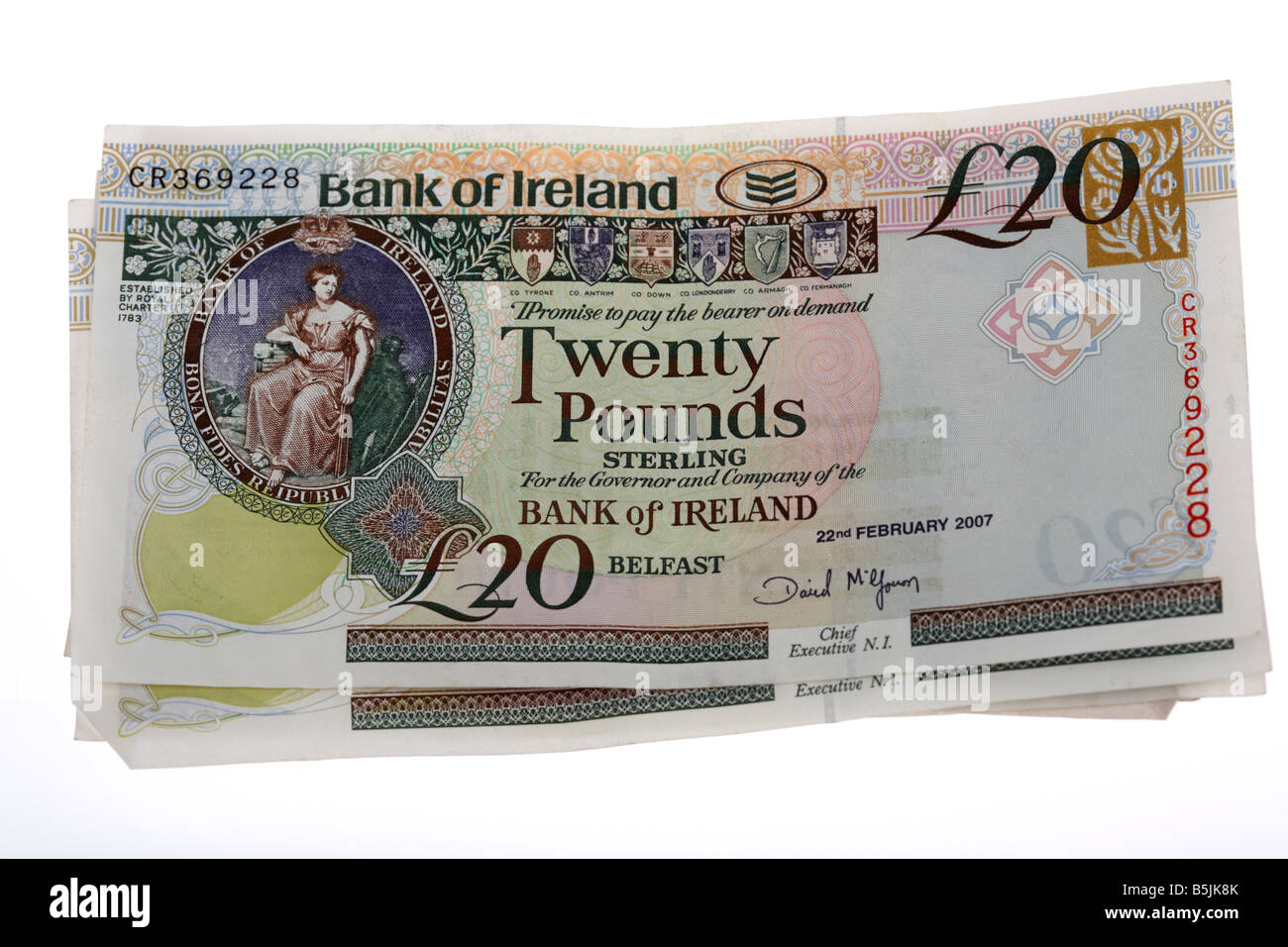 pile 20 pounds sterling northern ireland issued bank of ireland notes cash Stock Photo