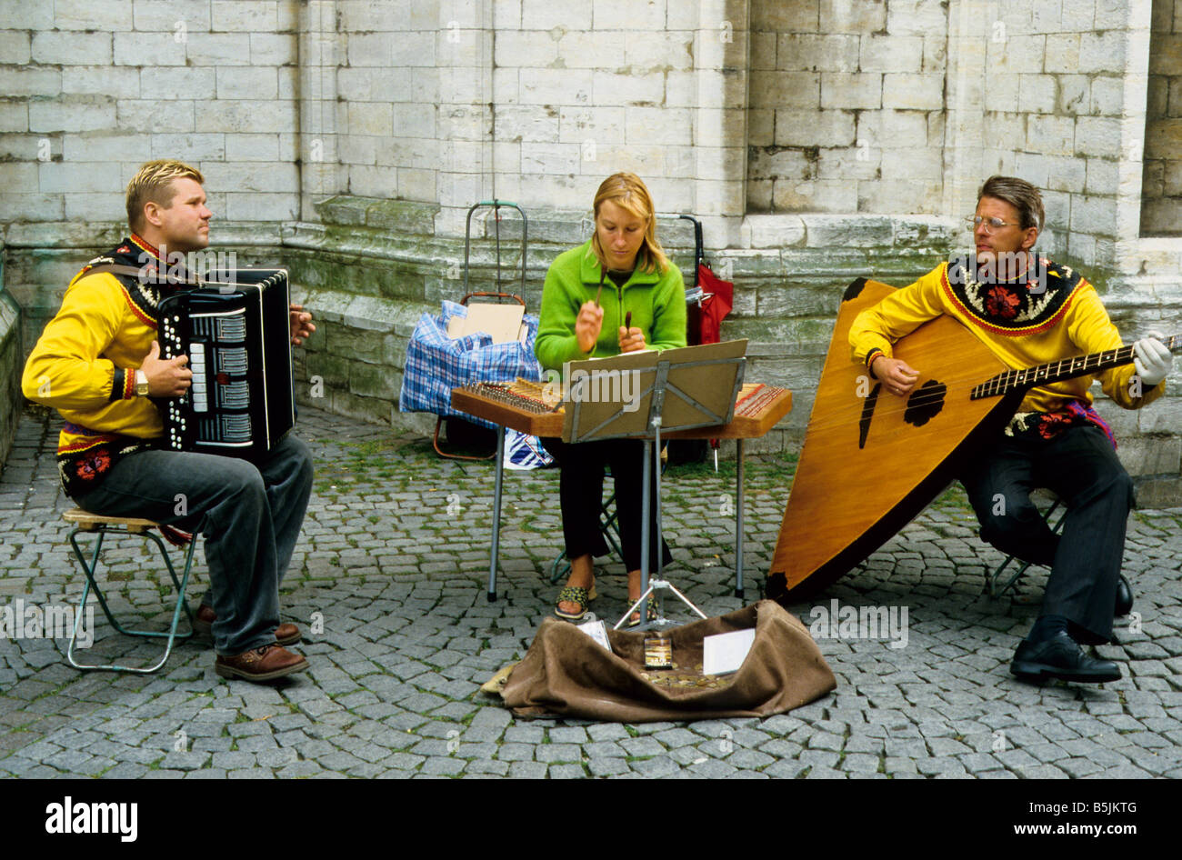 Buskers playing old instruments outside the cathedral, Antwerp, Belgium ...
