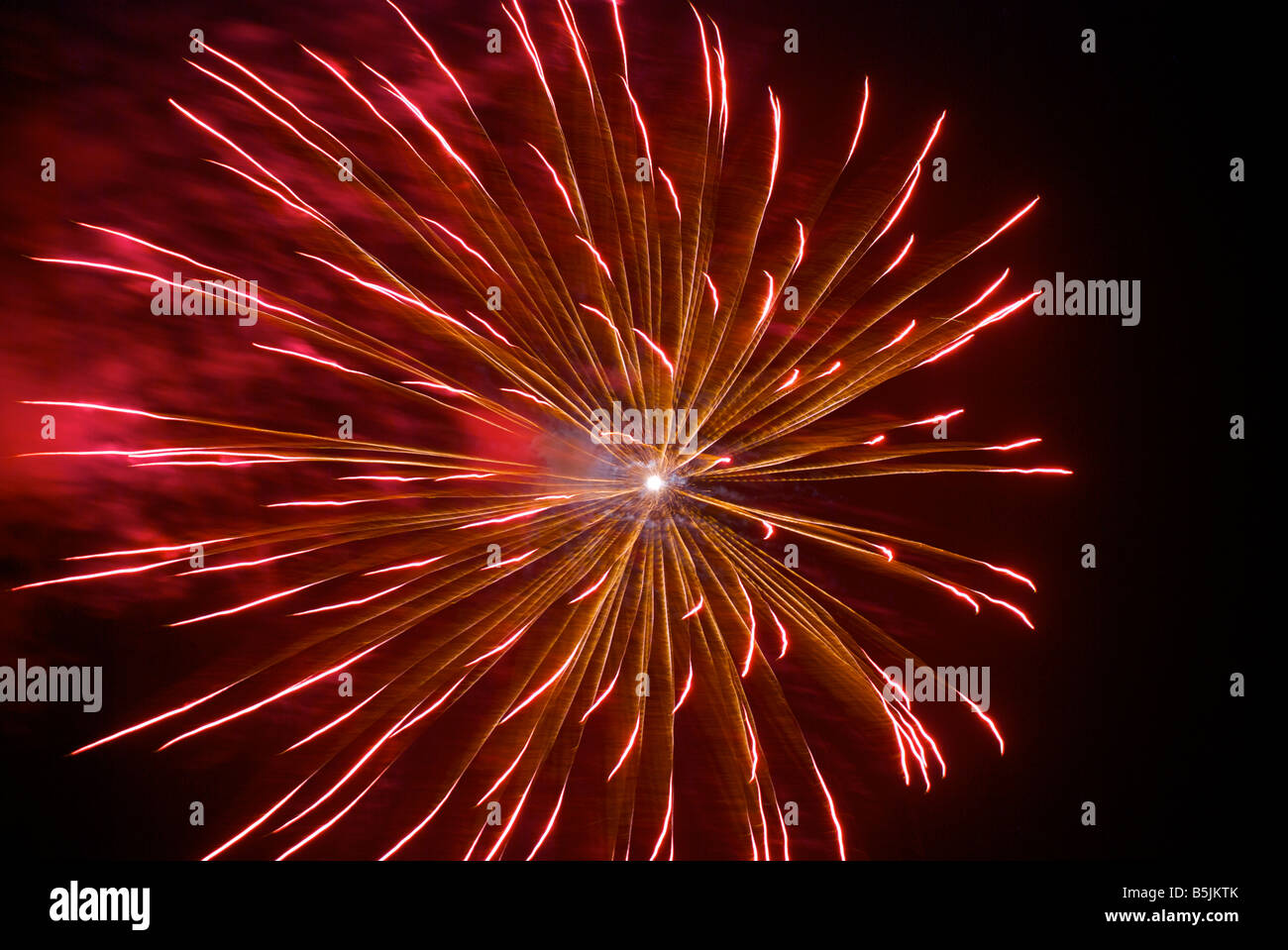 Colourful fireworks exploding in the night sky Stock Photo - Alamy