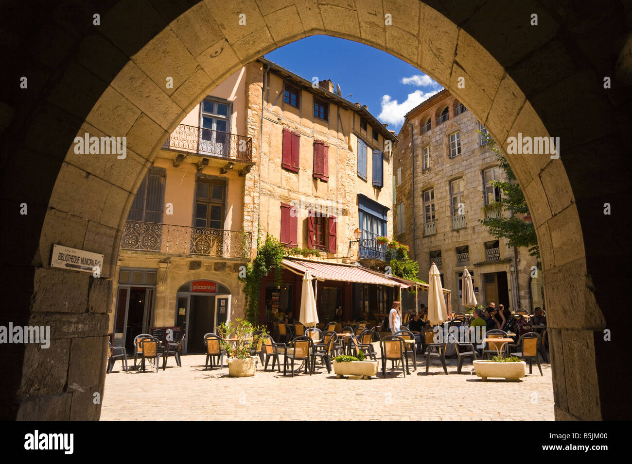 Pavement cafe restaurants in the medieval town square St Antonin Noble