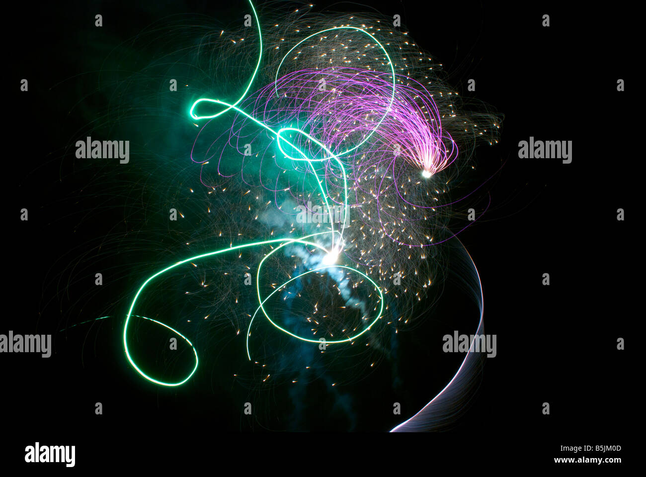 Colourful fireworks exploding in the night sky Stock Photo - Alamy