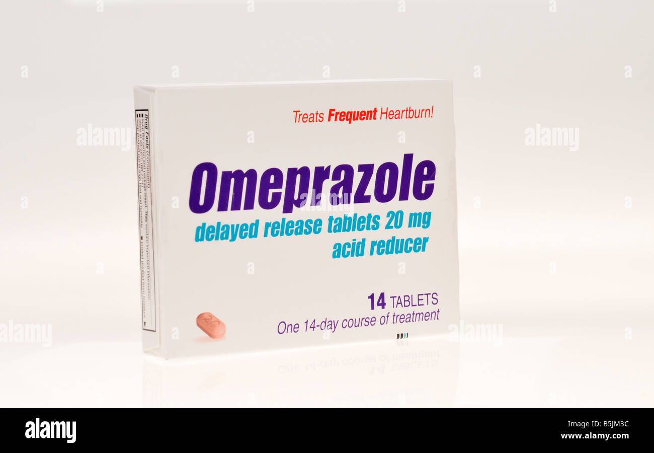 Omeprazole generic Prilosec drug for acid reflux disease and heartburn on white background. cut out Stock Photo
