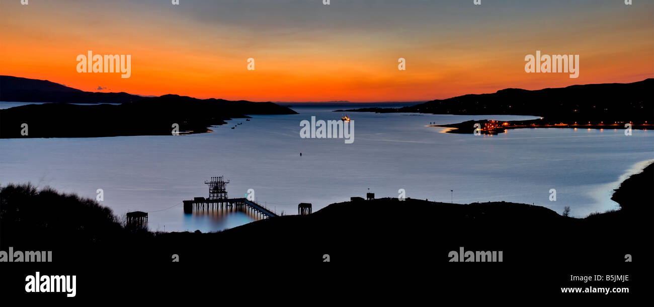 Sunset over Aultbea, Isle of Ewe and the Nato refuelling station. Taken from the viewpoint along the A832, Wester Ross, Scotland Stock Photo