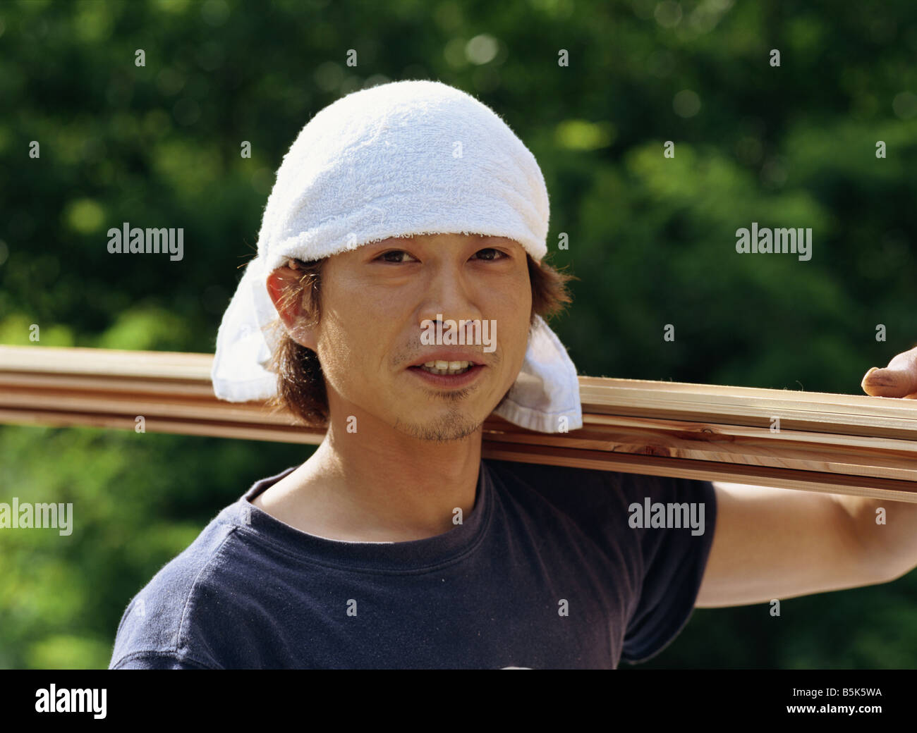 Portrait of a young Japanese carpenter Stock Photo Alamy
