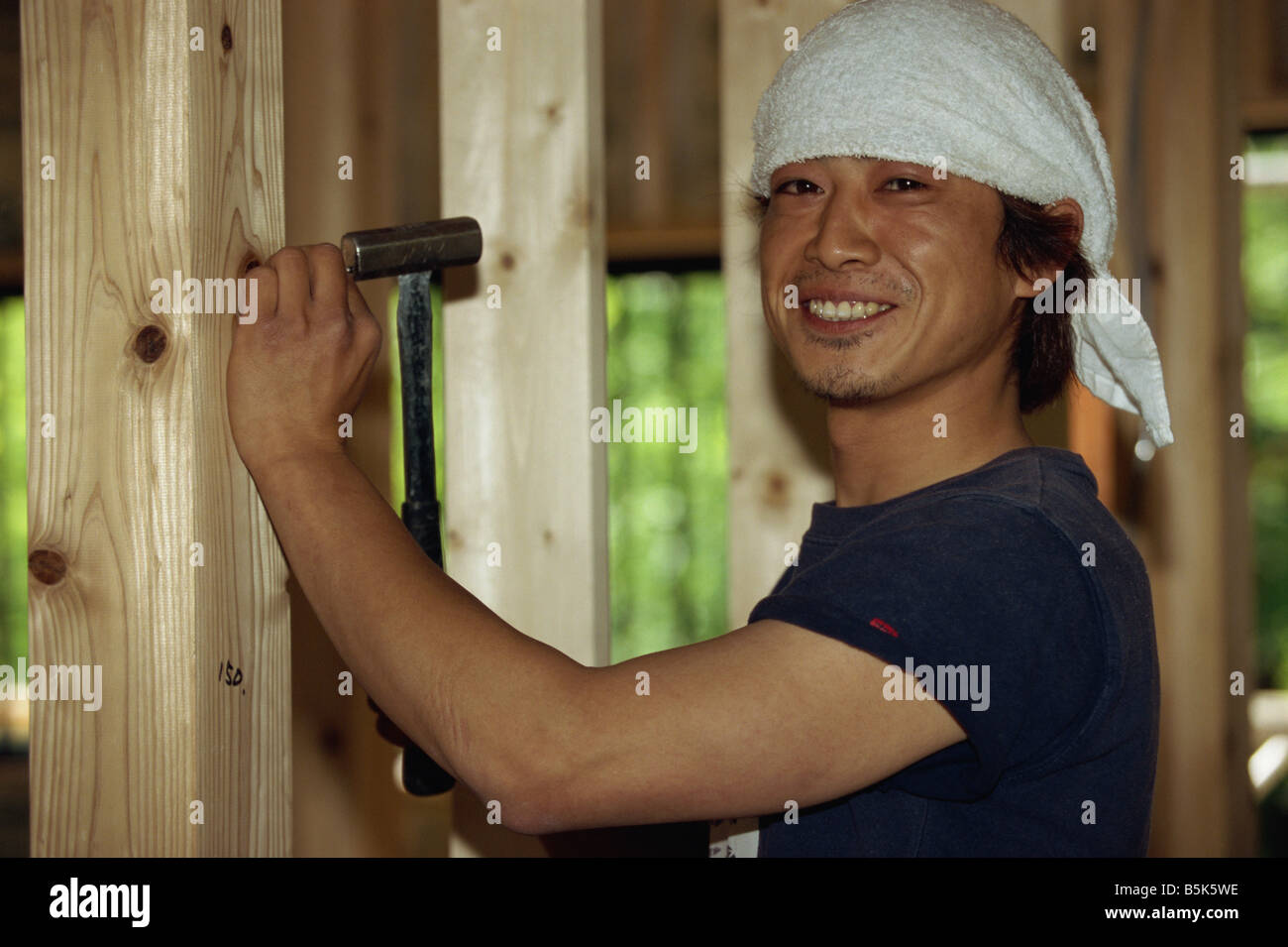 Portrait of a young Japanese carpenter Stock Photo Alamy