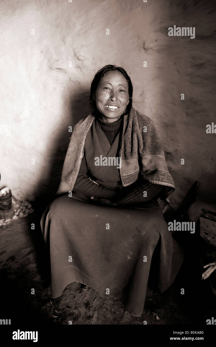 March 2008 Annapurna Nepal Traditional gurung woman in her kitchen and house Stock Photo