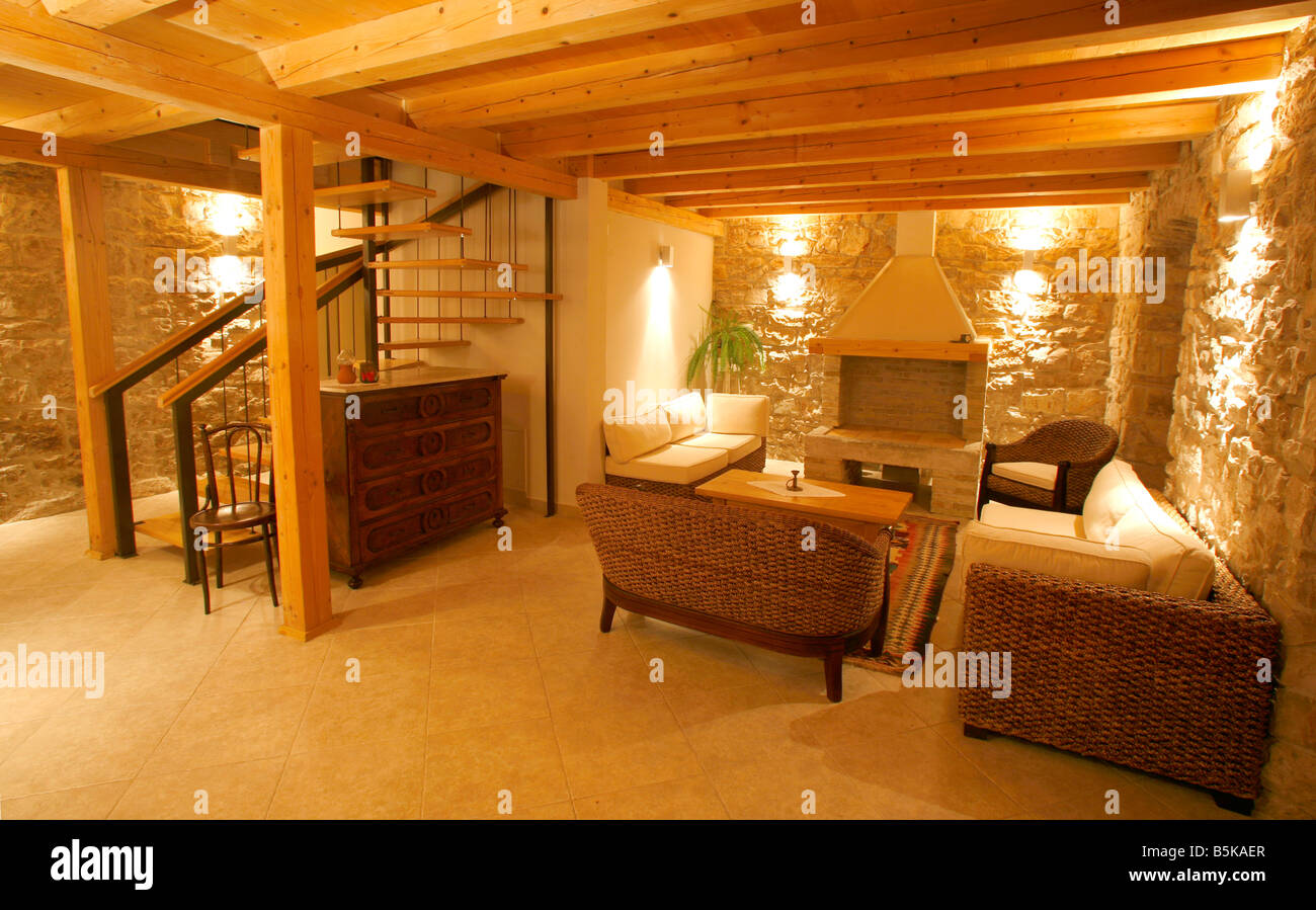 Luxury stone villa interior illuminated at night Stock Photo - Alamy