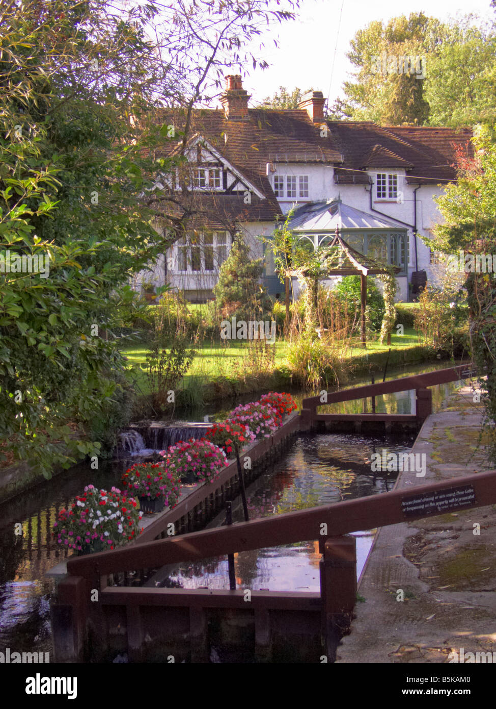Timber framed building at water's edge. Bourne End, Buckinghamshire