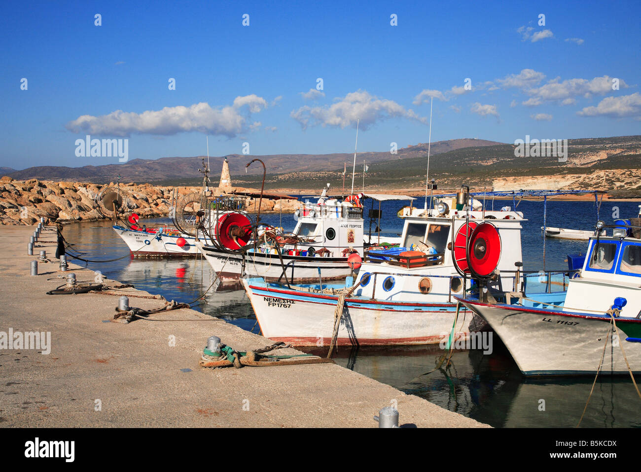 Boats in Agios Georgios St. George's Harbour in Cape Drepanum on the West Coast of cyprus in Akamas Peninsula Stock Photo