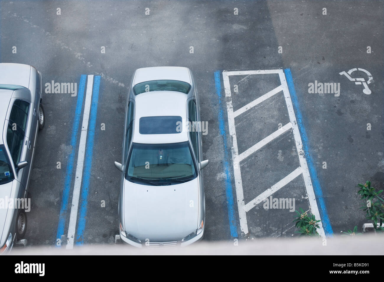 handicap parking area looking down from overhead Stock Photo