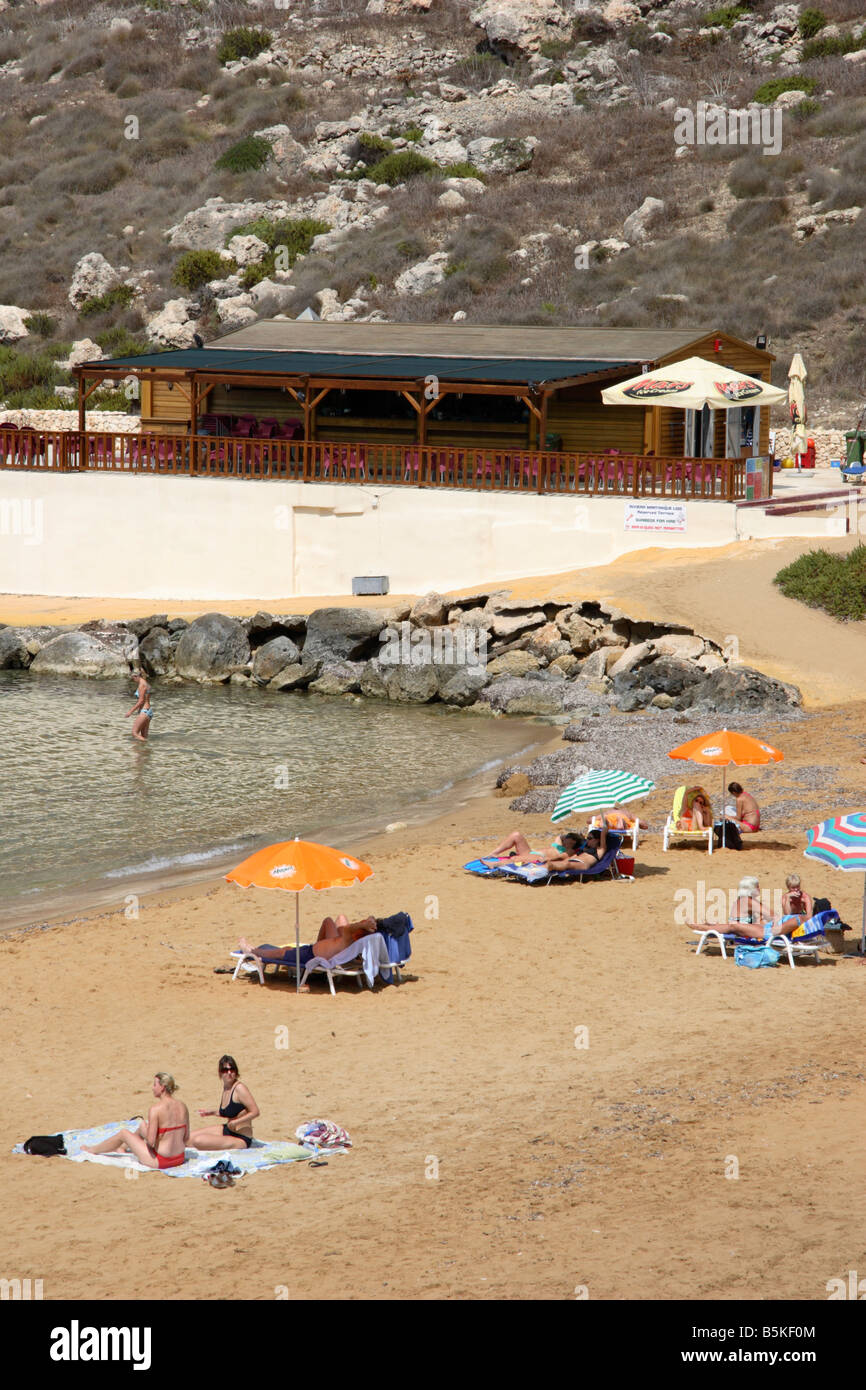 The sunny beach at 'Ghajn Tuffieha Bay' on the northwest coast of Malta. Stock Photo